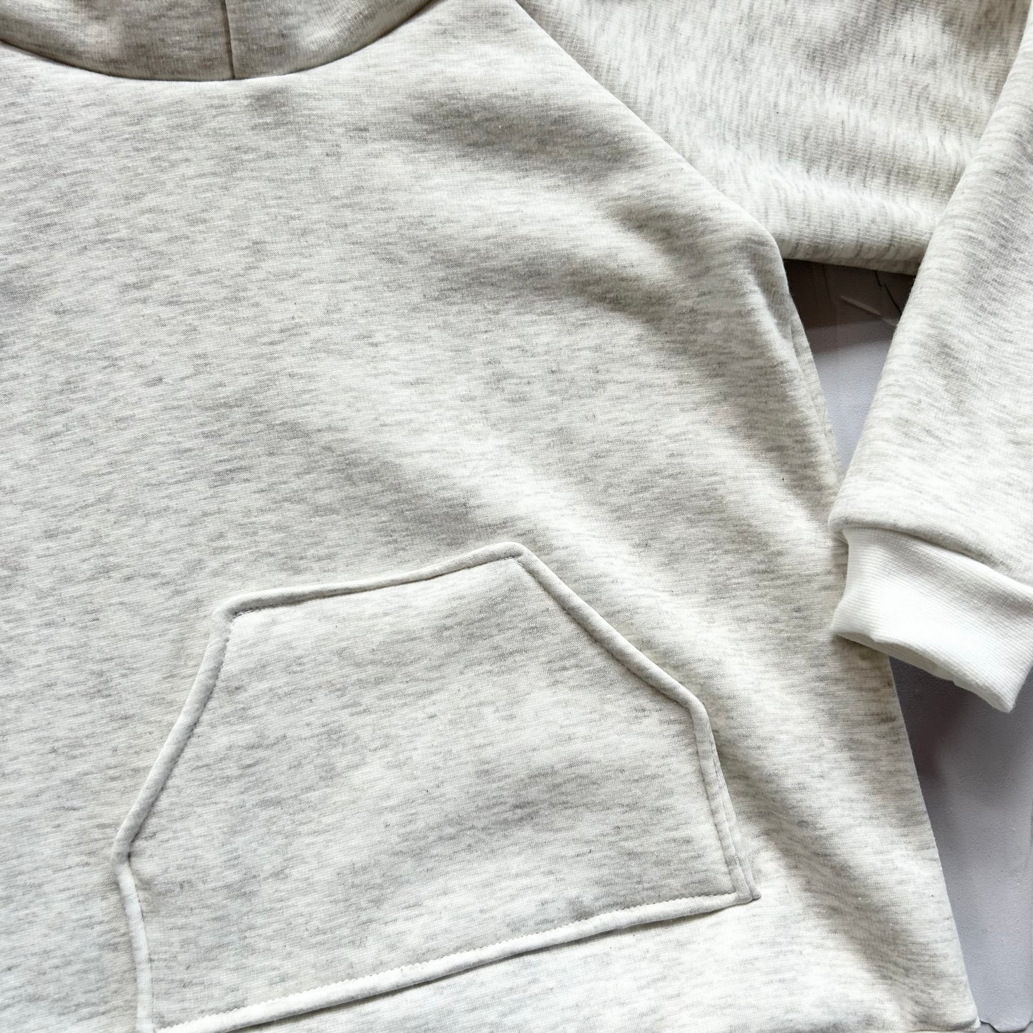 Heathered ecru sweatshirt