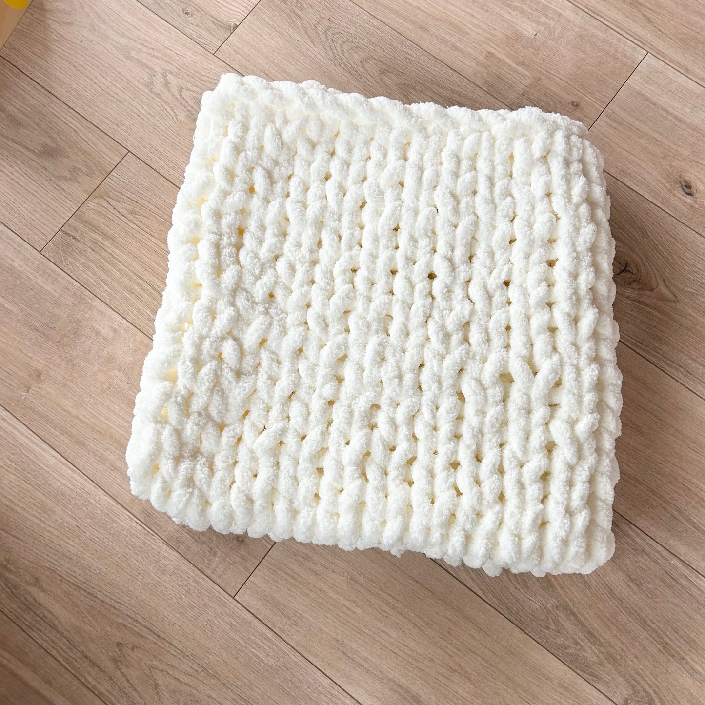 Off-white knitted blanket