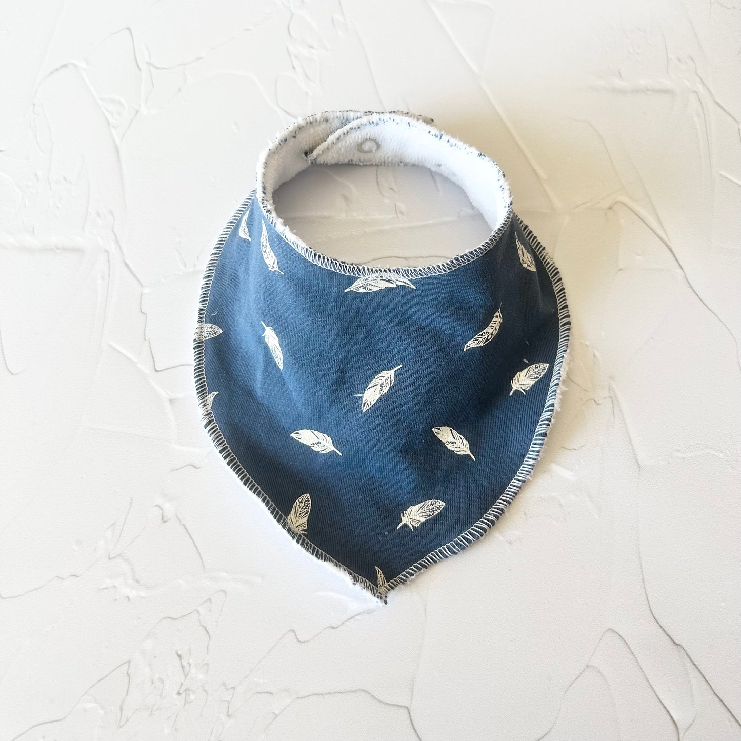 Bavoir Plumes bleu